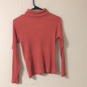 Orange turtle neck top